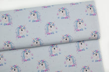 Tissu en ligne Québec jersey de coton lycra motif de licorne. Online fabric cotton spandex jersey knit with unicorn.