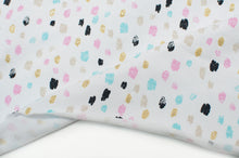 Tissu en ligne jersey de coton lycra brillant avec motifs de taches de couleurs. Online fabric cotton spandex glitter jersey knit with scratch.