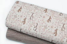 Tissu en ligne Québec jersey de coton lycra motif de lapin et de fleur parfait pour Paques. Online fabric cotton spandex jersey knit with bunnies and flowers perfect for easter.