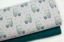 Tissu en ligne Québec jersey de coton lycra motif de crocodile en voiture. Online fabric cotton spandex jersey knit with crocodile in a car.