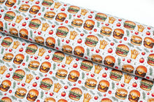 Tissu en ligne Québec jersey de coton lycra motif de hamburger et frites. Online Canadian fabric store cotton spandex jersey knit with burger and fries.