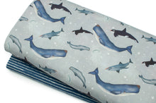 Tissu en ligne Québec jersey de coton lycra motif de baleines. Online fabric store cotton spandex jersey fabric from family frabics with whales.