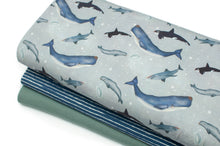Tissu en ligne Québec jersey de coton lycra motif de baleines. Online fabric store cotton spandex jersey fabric from family frabics with whales.