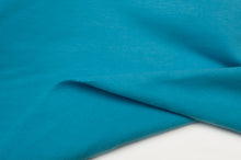 Tissu en ligne Québec coton ouaté léger, extensible et biologique. Online sweat hooded fabric organic and stretch.