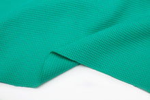 Tissu en ligne jersey gaufré couleur uni. Online fabric waffle jersey knit solid color.