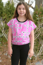 Tissu en ligne Québec jersey de coton lycra motif de Saint-Valentin avec mot de scrabble. Online fabric cotton spandex jersey knit with scrabble print.