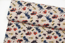 Tissu en ligne Québec jersey de coton lycra motif de dinosaures. Online fabric cotton spandex jersey knit with dinosaur.