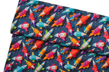 Tissu en ligne Québec french terry de coton lycra motif enfant de fusée en papier. Online fabric cotton spandex french terry knit with child paper rocket.