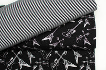 Tissu en ligne Québec jersey de coton lycra motif de guitare électrique. Online fabric cotton spandex jersey knit with guitar.
