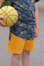 Tissu en ligne Québec jersey de coton lycra motif de garçon adolescent avec skate et jeux vidéo. Online fabric cotton spandex jersey knit with teen design.