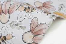 Tissu en ligne similicuir, faux cuir, cuirette avec motif de fleurs et d'abeille. Online fabric leather with bee and flowers.