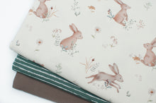 Tissu en ligne Québec jersey de coton lycra motif de lapins parfait pour Paques. Online fabric cotton spandex jersey knit with bunnies perfect for easter.