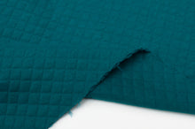Tissu en ligne matelassé de coton couleur uni. Online fabric diamond quilted cotton solid color.