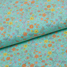 Tissu en ligne Québec jersey de coton lycra motif de fleurs. Online fabric cotton spandex jersey knit with flowers.