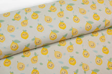 Tissu en ligne Québec jersey de coton lycra motif de citron kawaii. Online Canadian fabric store cotton spandex jersey knit with kawaii lemon.