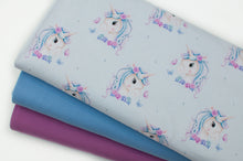 Tissu en ligne Québec jersey de coton lycra motif de licorne. Online fabric cotton spandex jersey knit with unicorn.