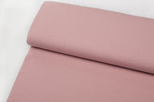 Tissu en ligne jersey de coton couleur uni rose. Online fabric cotton jersey solid pink color.