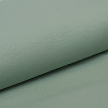 Tissu en ligne jersey de coton couleur uni vert. Online fabric cotton jersey solid green color.