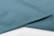 Tissu en ligne jersey de coton couleur uni. Online fabric cotton jersey solid color.