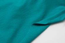 Tissu en ligne Québec french terry de coton spandex couleur bleu émeraude. Online fabric store cotton spandex french terry.