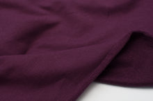 Tissu en ligne french terry de coton couleur mauve prune. Online fabric cotton french terry solid color.