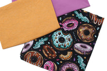 Tissu en ligne Québec jersey de coton lycra motif de beignes. Online fabric cotton spandex jersey knit with donut.