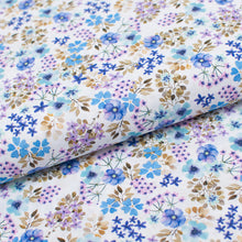 Tissu en ligne popeline de coton motif floral. Online fabric 100% cotton poplin with flowers.