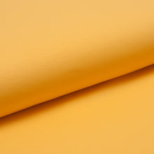 Tissu en ligne jersey de coton jaune. Online fabric yellow cotton jersey.