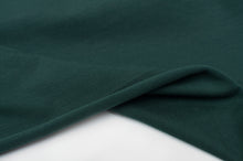 Tissu en ligne jersey de coton vert uni. Online fabric cotton jersey.