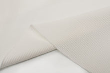 Tissu en ligne jersey gaufré couleur uni. Online fabric waffle jersey knit solid color.