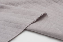 Tissu en ligne 100% coton matelassé. Quilted cotton fabric.