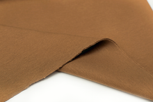 Tissu en ligne jersey bord côte couleur caramel. Online fabric caramel rib knit.