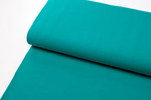 Tissu en ligne jersey de coton couleur émeraude. Online fabric solid color cotton jersey.