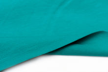 Tissu en ligne jersey de coton couleur émeraude. Online fabric solid color cotton jersey.