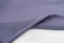 Tissu en ligne jersey de coton couleur mauve lilas. Online fabric solid color cotton jersey.