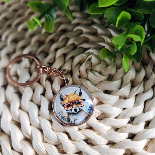 Porte-clés cabochon avec motif de renard. Cabochon key ring with a fox.