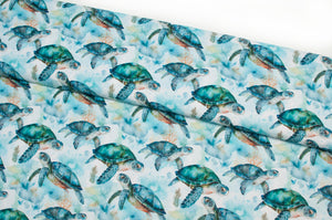 Tissu en ligne Québec jersey de coton lycra motif de tortue. Online canadian fabric store cotton spandex jersey knit with turtle.