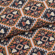 Tissu en ligne Québec jersey de coton lycra motif aztèque bohème. Online fabric cotton spandex jersey knit with aztec boho design.