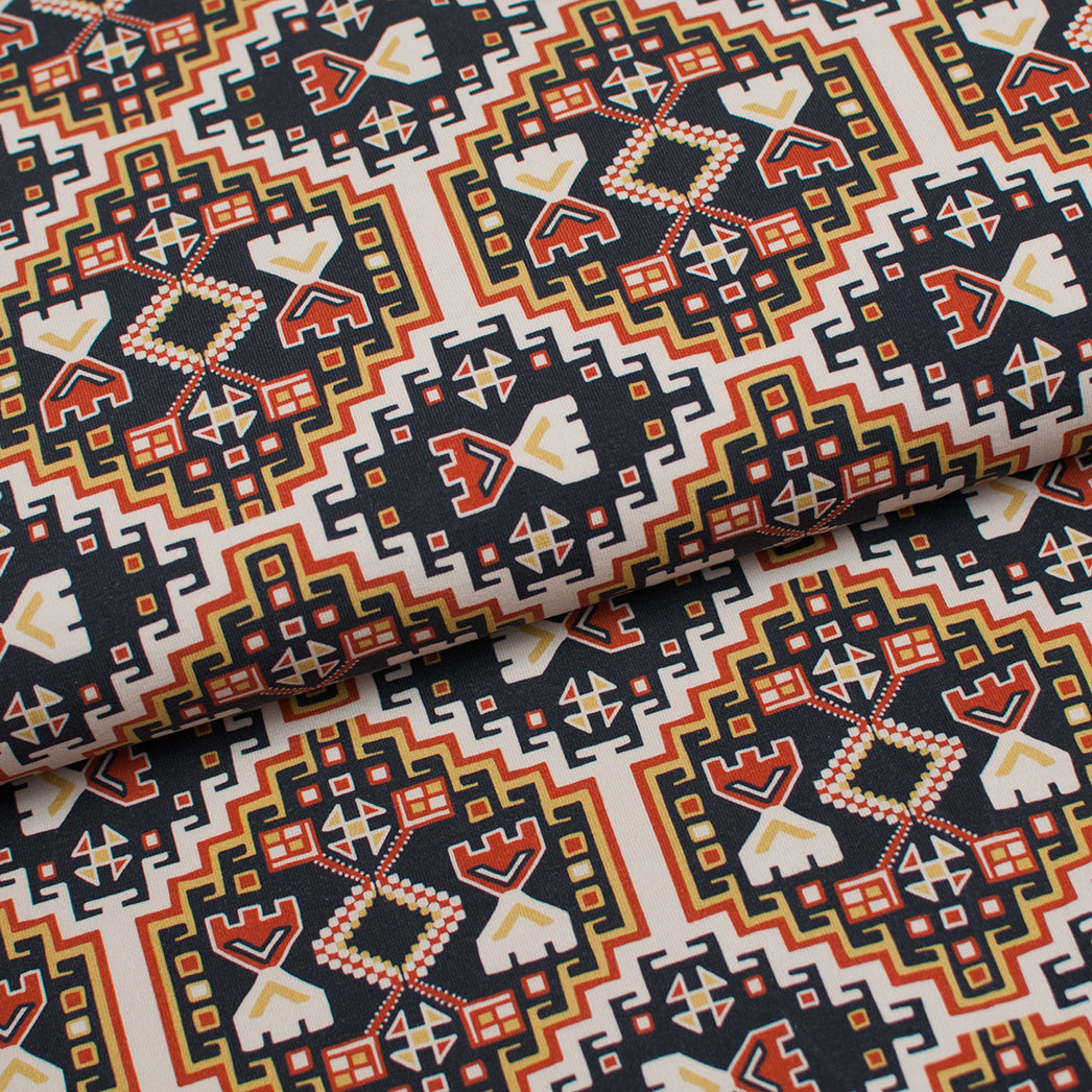 Tissu en ligne Québec jersey de coton lycra motif aztèque bohème. Online fabric cotton spandex jersey knit with aztec boho design.