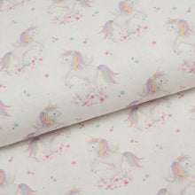 Tissu en ligne Québec jersey de coton lycra motif de licorne. Online fabric cotton spandex jersey knit with unicorn print.