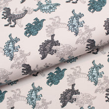 Tissu en ligne french terry de coton lycra motif de dinosaure. Online fabric cotton spandex french terry with dinosaur.