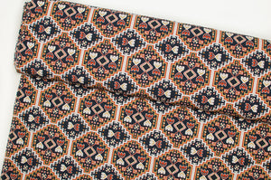 Tissu en ligne Québec jersey de coton lycra motif aztèque bohème. Online fabric cotton spandex jersey knit with aztec boho design.