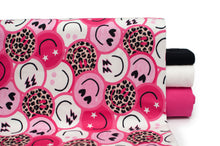 Tissu en ligne Québec jersey de coton lycra motif de bonhomme sourire avec léopard. Online fabric shop cotton spandex jersey knit with happy face.