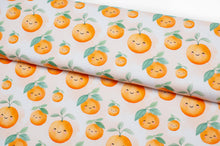 Tissu en ligne Québec french terry de coton spandex motif de clémentine. Online fabric cotton spandex french terry knit knit with orange fruit.