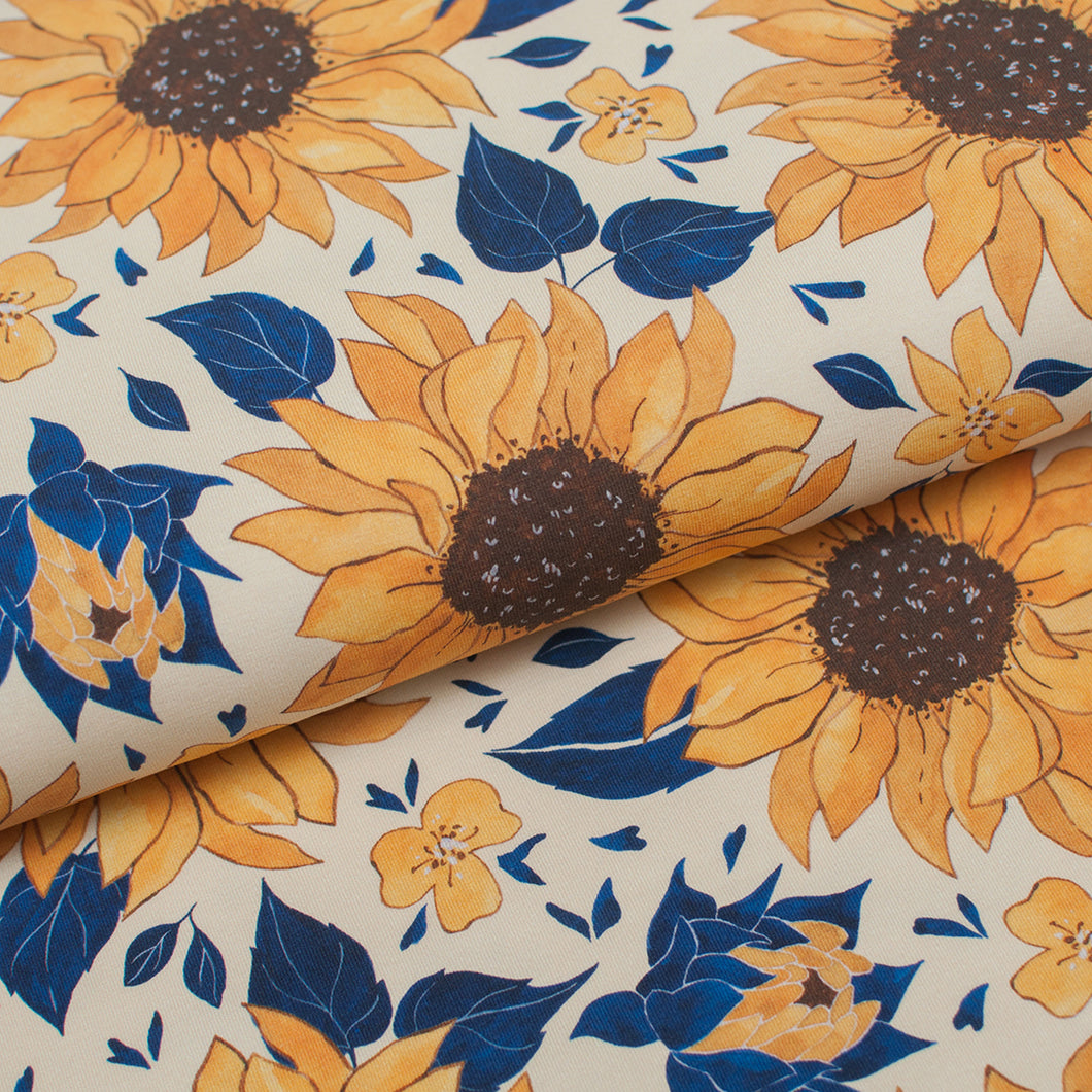 Tissu en ligne jersey de coton spandex motif de tournesol. Online fabric cotton lycra jersey knit with sunflower.