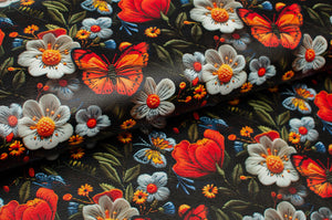 Tissu en ligne Québec similicuir, faux cuir, cuirette avec motif de papillon monarque et de fleurs. Online fabric leather with butterfly and flowers.