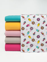 Shiny lycra cotton jersey line fabric with popsicle, ice cream and donut summer sweets patterns. Online fabric cotton spandex glitter jersey knit with popsicle, ice cream and donut.