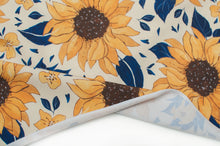 Tissu en ligne jersey de coton spandex motif de tournesol. Online fabric cotton lycra jersey knit with sunflower.