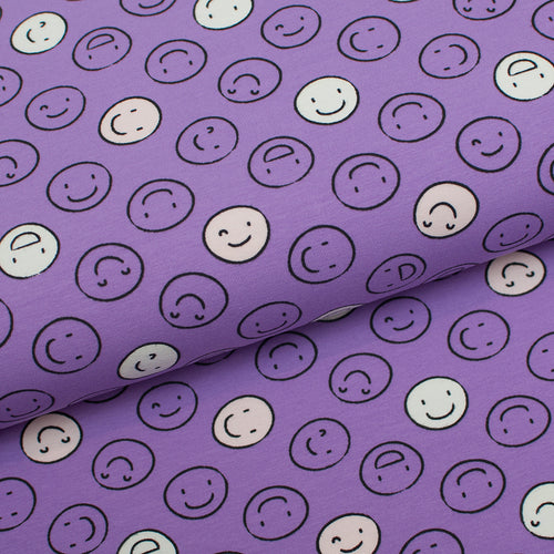 Tissu en ligne Québec jersey de coton lycra motif de smiley qui allument dans le noir. Online fabric cotton spandex jersey knit glow in the dark with smileys.