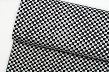 Tissu en ligne Québec jersey de coton lycra motif de carreaux. Online fabric cotton spandex jersey knit with black and white plaid.